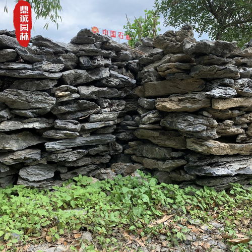 英石叠石堆叠假山流水造景设计石材 天然英石叠石产地堆放图片