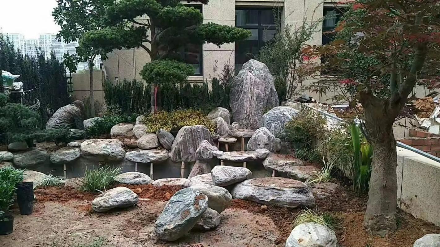 庭院景观设计 鱼池假山与流水生财的和谐之美