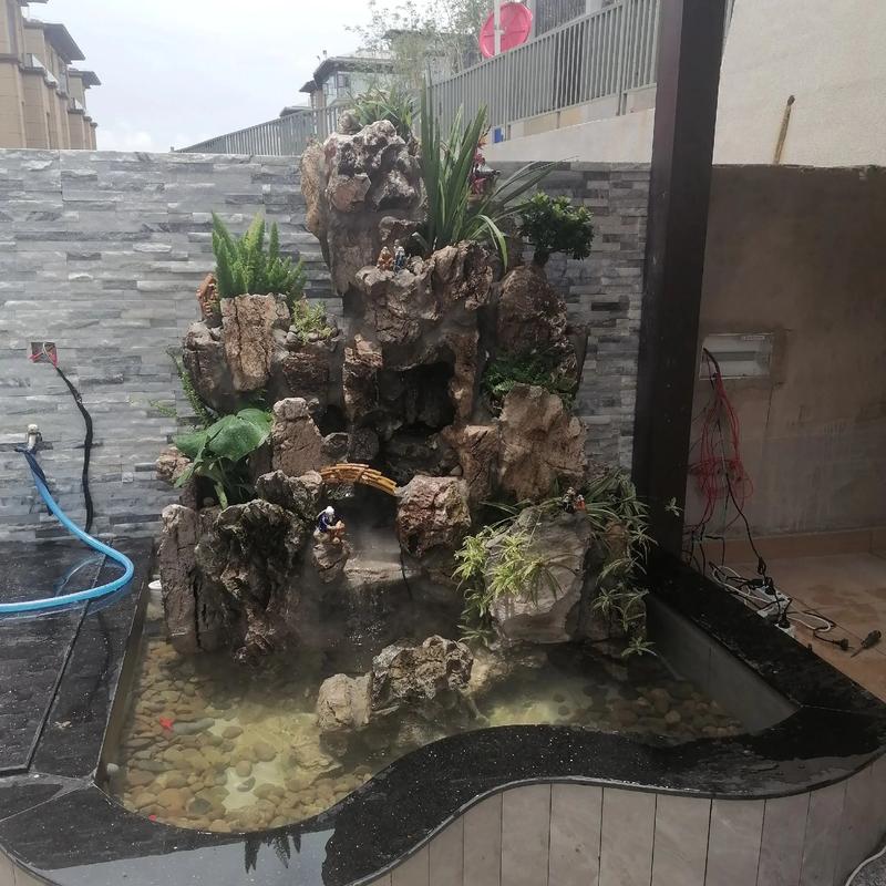 庭院景观假山石效果图 打造自然雅致的别墅庭院假山水池设计